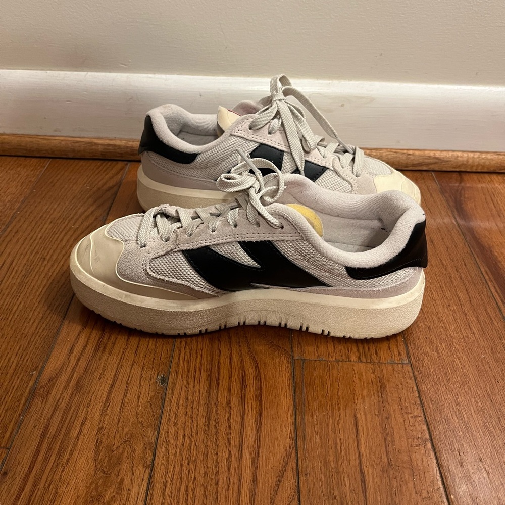 Women cream and black New Balance CT 302